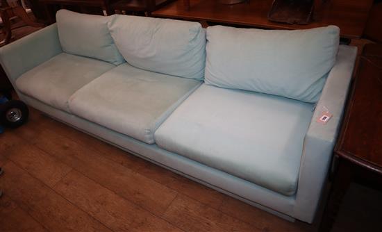 A large pale blue linen upholstered three seater settee L.240cm approx.